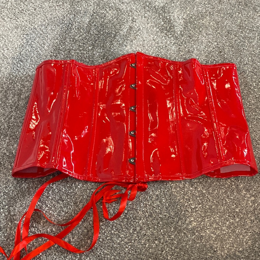 Red shiny waist trainer corset under breast